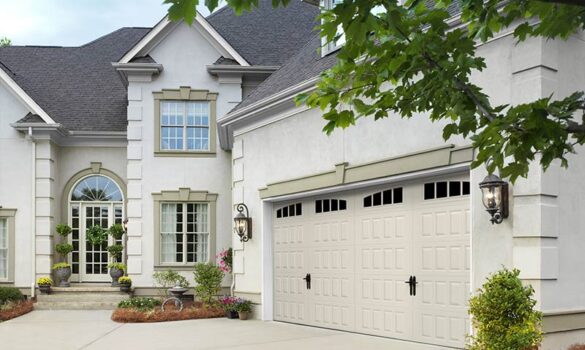 A single-family home with a large garage.